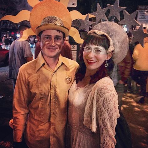 Go above and beyond with these stellar sun + moon costumes. Sun And Moon Costume, Halloween Couples Costumes, Childrens Halloween Party, Moon Costume, Halloween Couples, Moon Halloween, Couple Halloween Costumes For Adults, Sun And The Moon, Greek Goddess Costume