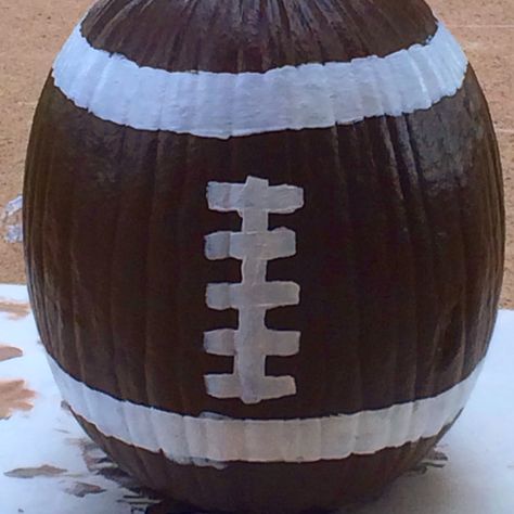 Little boy's painted pumpkin, football pumpkin Pumpkin Painting Ideas Football, Boy Pumpkin Decorating Ideas, Pumpkin Painting Ideas Boys, Football Pumpkins Painted, Boy Pumpkin Painting Ideas, Diy Pumpkins Painting, Cute Painted Pumpkin Ideas, Pumpkins Painting, Football Pumpkin