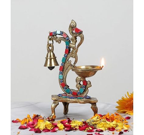 Material : Brass
Dimensions : Length: 5 inches (12.5 cm) , Width: 3 inches (7.5 cm) , Height: 8 inches (20 cm)
Ethnic Charm: The diya exudes a rich ethnic charm, making it ideal for use in traditional Indian festivals, ceremonies, and rituals. It's also a wonderful addition to your home's decor, adding a touch of tradition and authenticity to your living space.
Versatile Decor: Whether you place it in your living room, prayer room, or use it as a decorative centerpiece during Oil Lamp Fuel, Brass Diyas, Antique Oil Lamp, Antique Oil Lamps, Tree House Decor, Home Decor Hooks, Home Decor Crate, Home Decor Baskets, Moustaches