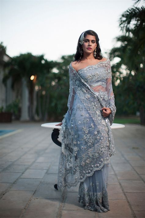 Beautiful grey lace saree with off shoulder blouse| WedMeGood| #wedmegood #indianweddings #sarees #lacesarees #grey #lace #offshoulder #blouse #blousedesign Net Embroidery Saree, Lehenga Images, Bridal Campaign, Misha Lakhani, Lehenga Jewellery, Net Embroidery, Saree Draping Styles, Lace Saree, Unique Blouse Designs