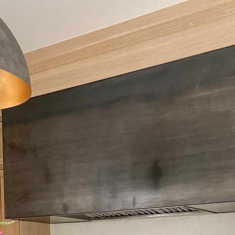 Melissa Liddiard | Intentional Design on Instagram: "One of the most asked questions of all time… What material is our hood? Steel sheet metal! . My husband found the coolest inspiration photo and we shared it with our builder. Then our builder worked hand-in-hand with a local steel company to create this beautiful finish. It definitely has a blue patina. . Make sure you check out stories today, I’m going to be sharing photos of what it looked like before. If you are hoping to replicate the lo Metal Range Hood Kitchen, Metal Kitchen Hood, Melissa Liddiard, Modern Hood, Hood Range, Metal Range Hood, Steel Company, Kitchen Hood Design, Intentional Design