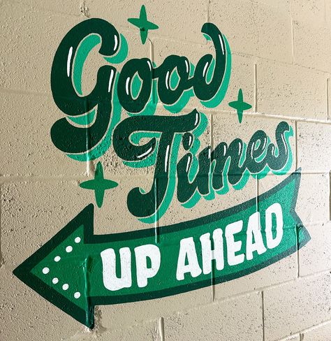 Art by Olga Muzician. Good times up ahead lettering mural This Must Be The Place Mural, Mural With Words, Welcome Mural, Mural Typography, Typography Mural, Window Lettering, Book Collage, Tour Group, Mural Inspiration