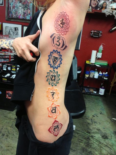 Chakra Tibetan symbol Tattoo Buddhist, Kundalini Tattoo, Chakras Tattoo, Small Wave Tattoo, Chakra Tattoo, Polynesian Tattoos, Om Tattoo, Geometric Tattoos, Spiritual Tattoos