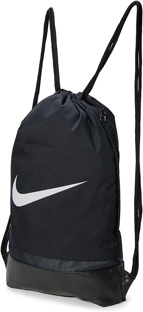 WATER RESISTANT GYM BAG: Nike gym bag with water-resistant 600D fabric made of polyester helps keep your gear dry. MESH PANEL: Small gym bag is designed with a mesh panel at the bottom to ventilate your gym gear after an intense sweat sesh. DRAWSTRING BACKPACK: The drawstring closure at the top of this Nike bag provides quick, easy access to the interior to store your gear. Nike Gym Bag, Small Gym Bag, Nike Bag, Bag Nike, Small Gym, Gymnastics Quotes, Nike Quotes, Sports Magazine, Nike Bags