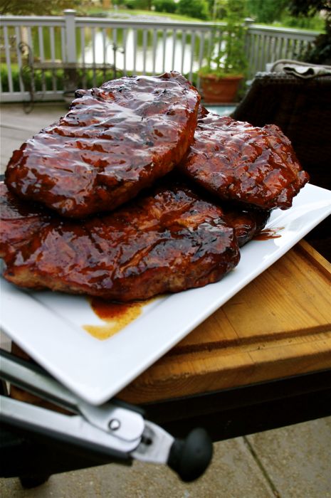 An explanation of what exactly a pork steak is as well as how to perfectly prepare them on the grill, slathering them with a gooey BBQ sauce. | A Midwestern BBQ Staple – Pork Steaks | http://grillinfools.com Bbq Pork Steaks, Grilled Pork Steaks, Pork Steak Recipe, Pork Steaks, Grilled Steak Recipes, Barbecue Ribs, Pork Steak, Smoked Meats, Pork Ham