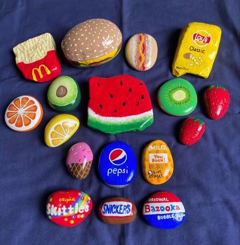 Cute Rock Painting Ideas Easy Food, Painted Rock Play Food, Cute Things To Paint On Rocks Easy, Circle Rock Painting Ideas, Rock Food Painted, Rock Painting Ideas Food, M And M Rock, Food Rock Painting Ideas, Rocks Painted Like Food