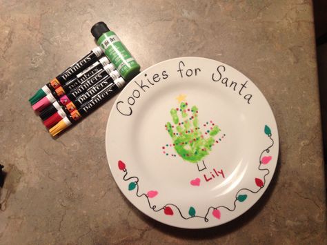 Cookies for Santa handprint plate.  Used a dollar store plate, enamel acrylic paint and paint markers.  Baked at 350 for 30 min. Christmas Plates Kids, Handprint Plate, Diy Christmas Plate, Santa Handprint, Baby Christmas Crafts, Cookies For Santa Plate, Handprint Christmas, Santa Plate, Cookies For Santa