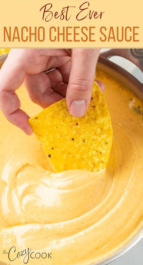 A hand dipping a tortilla chip into a skillet of Nacho Cheese sauce. Nachos With Nacho Cheese Sauce, Cheese Sauce For Nachos Without Velveeta, Best Nacho Dip Recipes, Cheese Sauce With Velveeta Recipe, Nacho Cheese Sauce Velveeta Rotel, Quick Nacho Cheese Sauce, Nacho Cheese In Crockpot, Crockpot Nachos Cheese, Melted Velveeta Cheese Sauce