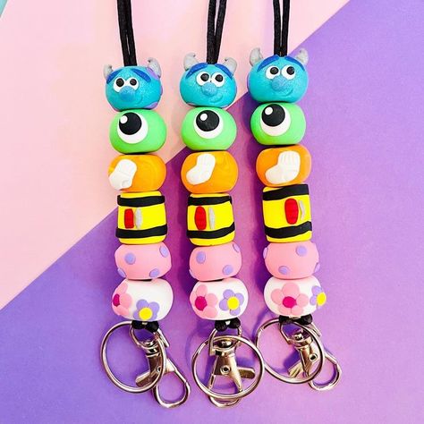 We have a 23-19! This lanyard is inspired by Disney's Monster's Inc.! Polymer Clay Accessories, Clay Accessories, Custom Lanyards, Monster Inc, Kids Clay, Teacher Lanyard, Beaded Crafts, Disney Crafts, Polymer Clay Art