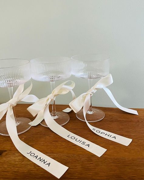 Champagne Coupe Glass & Personalised Ribbons - Now available. A large range of bow colours to suit your wedding theme 🥰 #bridesmaidproposal #bride #bridestobe #brides2025 #bridesmaidglass #brideglass #bridesofinstagram #bridestyle #bridesofuk #proposalbox #bridetribe #bridetrends #bridetribe💍 Bows On Champagne Glasses, Bridesmaid Glasses, Black And White Wedding Theme, White Wedding Theme, Personalized Ribbon, Thanksgiving Table Settings, Proposal Box, Bride Tribe, Champagne Glasses