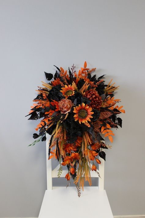 This Wedding Bouquets item by FlowerDreamsBoutique has 271 favorites from Etsy shoppers. Ships from Ukraine. Listed on Oct 4, 2024 Orange And Purple Fall Wedding Bouquet, Dark Sunflower Wedding Bouquet, Terracotta And Black Wedding Theme, Fall Wedding Burnt Orange And Black, Fall Wedding Black Dress, Black And Copper Wedding Bouquet, Spooky Theme Wedding, Orange And Black Flower Arrangements, Black Sage And Burnt Orange Wedding