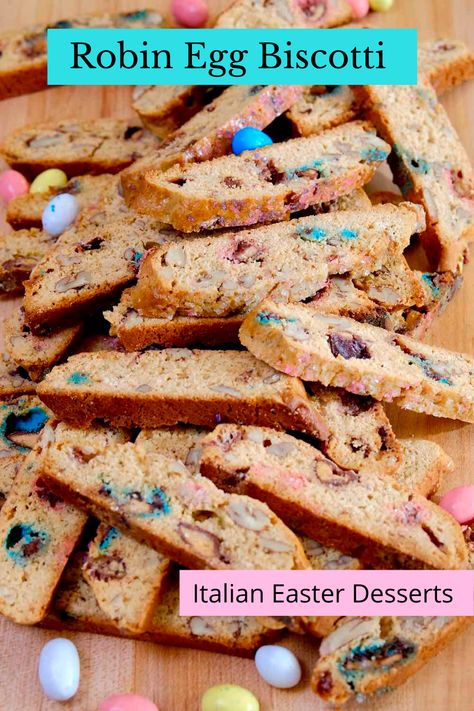 Slices of robin egg biscotti piled on a maple wood board with malted robin eggs scattered around the cookies. Easter Biscotti Recipe, Easter Biscotti, Easter Baked Goods, Healthy Biscotti Recipe, Best Biscotti Recipe, Italian Easter Cookies, Spring Sweets, Easter Pastries, Easy Biscotti Recipe