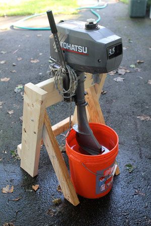 For a number of years, I used a piece of 2x4 screwed to the side of the garden shed as a mount for my 3.5hp Tohatsu outboard. It would perch happily thereon while I dangled its nether regions in a cooling tub of fresh water, sputtering and burbling away as the salt got rinsed from its innards.  This year, I decided something more sophisticated was in order for my faithful motor. I wanted a Boat Conversion, Outboard Motor Stand, Aluminum Boats, Happy Fishing, Inflatable Boats, Boat Restoration, Salt Water Fishing, Diy Boat, Boat Ideas