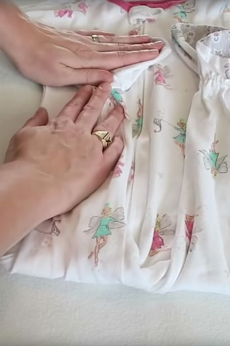 Folding Baby Pajamas, Folding Baby Onesies, How To Fold Onesies, Folding Onesies, Marie Kondo Folding, Folding Baby Clothes, Folding Shirts, Kids Clothes Storage, Feminist Baby