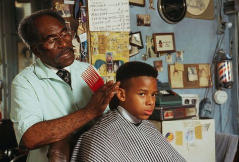 The Arthur Anderson Barber Shop in Mattoon, Illinois, which only served white customers, circa 1920. Above: Louis McDowell gives a young customer a high top fade in Paterson, New Jersey, in 1994. Via the Library of Congress. Barber Haircut Styles, Black Barbershop, Mens Barbershop, Black Haircut Styles, High Top Fade, Barber Haircuts, Hat Club, Vintage Barber, Tony Curtis