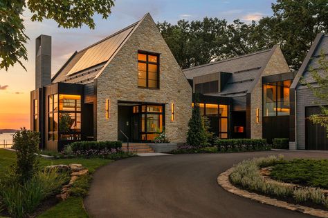 A remarkable stone and glass cottage in harmony with Lake Minnetonka Modern Belgian Farmhouse Exterior, Large Open Floor Plan Living Spaces, Modern Tudor Landscaping, Midwest Homes Exterior, Modern California Home Exterior, L Shaped Homes Exterior, Minnesota Houses, Contemporary Mountain Home Exterior, Dream Farmhouse Exterior