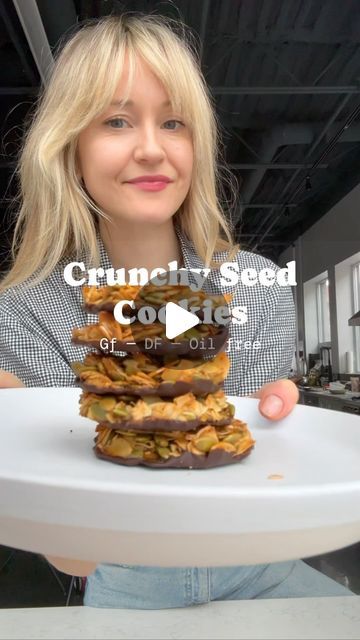 330K views · 13K likes | RILY on Instagram: "Crunchy Seed Cookies 🍪 

1/2 cup raw sliced almonds 
1/2 cup raw pumpkin seeds
1/2 cup unsweetened coconut flakes 
1/4 cup honey 
1 large egg 
1 tsp vanilla extract
Pinch of sea salt
150g dark chocolate (70%) 

1. Preheat oven to 325°F (163°C) and line a baking sheet with parchment paper.
2. In a big bowl, mix sliced almonds, pumpkin seeds, coconut flakes, honey, egg, vanilla extract, and sea salt.
3. Scoop portions onto the baking sheet, flatten with a spoon, and bake for 12-15 minutes until golden.
4. Let cool for 15 minutes to firm up.
5. Chill cookies in the fridge for 30 minutes then remove them from the parchment paper.
6. Chop dark chocolate, melt, and dip cookies in chocolate.
7. Place chocolate-side up on parchment paper and sprinkle w Crunchy Seed Cookies, Crunchy Desserts, Dip Cookies, Flax Muffins, Meatless Meals Healthy, Seed Cookies, Raw Pumpkin Seeds, Dipped Cookies, Low Carb Sweets