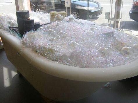 Our window display! Old claw foot tub and "bubbles" www.bathhousesoap.com Fake Bubbles Decorations, Fake Bubbles For Props, Fake Bubbles, Bubble Bath Photography, Shrek Musical, Bath Party, Store Merchandising, Stage Management, Bath Bubbles