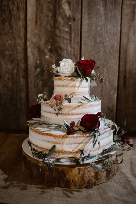 Red and White Rustic Wedding In Tennessee via TheELD.com Red Black And White Rustic Wedding, Deep Red And Grey Wedding, Red Sage And White Wedding, Red And Gold Rustic Wedding, Red White Green Wedding Theme, Red And Black Rustic Wedding Decorations, Red And White Rustic Wedding, Maroon Western Wedding Theme, Western Wedding Burgundy