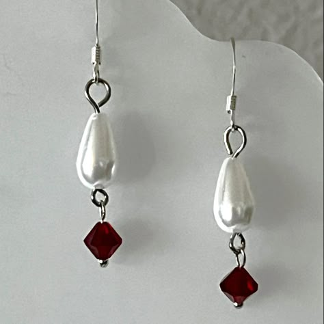 New Handmade Earrings Of Japanese White Teardrop Acrylic Pearls, Siam Red Swarovski Crystals, And Silver-Plated Flat Coil Fishhook Ear Wires. These Lovely Earrings Measure 1-1/2" Long And 1/4" Wide. They Are Sophisticated Enough To Wear At A Wedding, On The Town At Night, Or Dressed Casually During The Day. They Have A Vintage Boho Look. * This Is A One-Of-A-Kind Pair Of Earrings. * There May Be Some Color Discrepancies Due To Different Monitor Settings. The Colors Are Described As Clearly And G Red And Pearl Earrings, Diy Silver Earrings, Christmas Earrings Ideas, Red Bead Earrings Handmade Jewelry, Elegant Red Teardrop Earrings With Ear Wire, Christmas Bead Earrings, Red Beaded Drop Earrings With Ear Wire, Red Sterling Silver Beaded Earrings Gift, Diy Bead Earrings