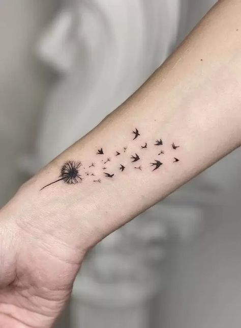 What Do Dandelion Tattoos Mean? Is It For You? Dragonfly Fairy Tattoo, Dandelion Bird Tattoos, Watercolor Dandelion Tattoo, Numerals Tattoo, Dandelion Tattoo Meaning, Dandelion Tattoos, Dandelion Tattoo Design, Bird Tattoo Meaning, Tattoo On Wrist