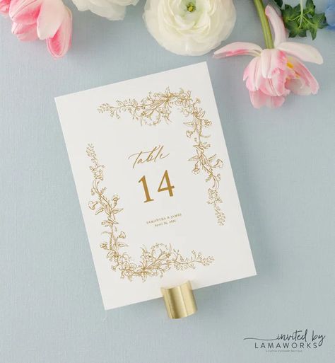 Add printed beauty to your wedding tables with our French Gold Floral Table Numbers. These elegant signs in 5x7 or 4x5 sizes bring a classic touch to your wedding decor. Personalize each table setting for a unique and timeless celebration. Wedding Table Numbers Elegant, Gold Wedding Table Numbers, Table Numbers Wedding Elegant, Champagne Gold Wedding, Neutral Wedding Decor, Bride To Be Decorations, Elegant Wedding Table, Classy Wedding Decor, Table Number Sign