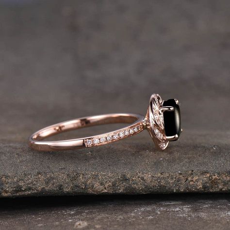 Black Onyx Diamond engagement ring in rose gold Product Information Engagement Ring: Metal Sterling Silver, 10k/14k/18k gold, Platinum Center Stone Natural Black Onyx Shape Round Weight approx 1.25 carat Size 6.5 mm Accent stones Diamonds Set Prong,Pave Set Wedding Ring Women, Halo Wedding Ring, Wedding Rings Halo, Women Ring, Ring Metal, Ring Women, Diamond Halo, Gold Platinum, Wedding Rings For Women