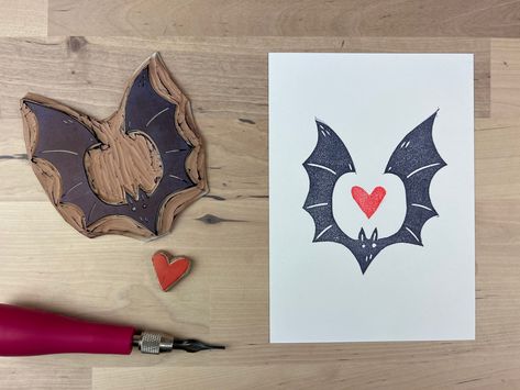 5 x 7" Legion Stonehenge White 250 gsm paper Hand printed using navy and red archival stamp ink Open edition hand signed This little hand printed bat brings the Halloween love all year long. Made from hand carved linoleum block. Please note: Variations in ink and registration occur with each print. Halloween Linocut Prints, Multi Block Lino Print, Print Block Ideas, Lino Print On Clothes, Halloween Lino Print, Spooky Linocut, Bat Linocut, Block Print Ideas, Halloween Linocut