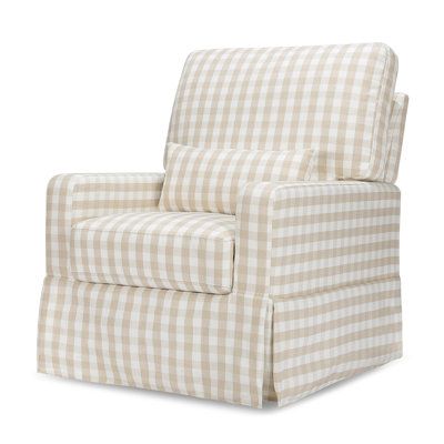 The Crawford glider offers a modern take on the traditional slipcover style and brings nursery comfort to a new level with its plush pillow back design, added lumbar pillow, and wide seat. Its smooth, back-and-forth gliding motion helps you rock your baby to sleep with ease, while the convenient swivel creates an inviting repose for both you and your baby. Upholstery Color: Tan Gingham Namesake Crawford Pillowback Comfort Swivel Glider - Gliders in Yellow | Perigold Cozy Seats, Baby To Sleep, Chair And A Half, Mcgee & Co, Swivel Glider, Gingham Fabric, Plush Pillow, Nursery Furniture, You Rock