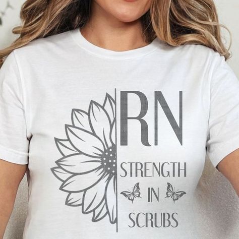 DeAnna Felthauser on Instagram: "Registered Nurse Shirt, Nurse Gift, Nurse Week Gift, RN Nurse T-shirt, Superhero Nurses, Graduation Gift, Nurse Apparel, Floral Nurse Tee https://etsy.me/4dpYOzN #gray #shortsleeve #cutenurseshirt #giftfornurse #matchingnurseshirt #nurseheroshirt #nurselifetshirt #nursepartytshirt #nurseshirt" Nurse Shirts Ideas, Nurse Week, Nurses Week Gifts, Monogram Shirts, Nurses Week, Nursing Clothes, Nurse Shirt, Registered Nurse, Nursing Tshirts