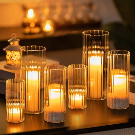 PRICES MAY VARY. Dimensions: 2.6'' x 5.9'' | 3.15'' x 7.9'' | 3.9'' x 9.8'' | Set of 6 Assorted Glass Cylinder Vase. Work well with floating candles, pillar candles and flowers. Modern Candle Vase: This glass hurricane cylinder can be used as ribbed glass vase as well as glass hurricane candle holder. Fluted glass cylinders design add a unique touch to your home. It a neutral glass pillar candle holder that shows off plants without being over stating, and is the most effective decoration for alm Mason Jar Centerpieces With Candles, Cocktail Centerpieces Simple, Red Glass Candle Holders, Wedding Candle Holders Centerpiece, Copper Vases Wedding, Wedding Table Garland With Fairy Lights, Wedding Centerpieces Votive Candles, Ribbed Candle Holder, Fluted Candle Holder