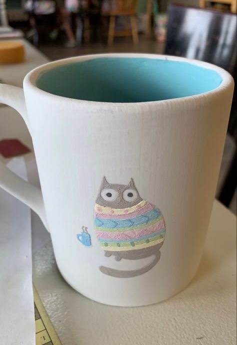 pottery ceramics cat mug cat with a sweater mug painting glaze clayfish bisque idea pin kiln inspo Cats Pottery Painting, Pottery Painting Cat Mug, Cat Mug Pottery Painting, Painted Clay Mugs, Inside Mug Painting Ideas, Glaze Ideas Pottery, Cat Mug Painting, Painted Ceramic Mug Ideas, Weird Pottery Ideas