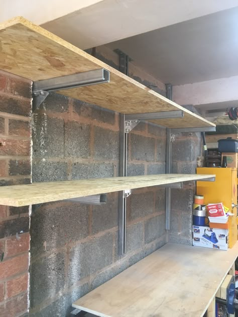 Garage wall shelving. 41x41 unistrut with OSB shelves Osb Garage Walls, Osb Shelves, Unistrut Projects, Shelves In Garage, Unistrut Ideas, Electronics Workspace, Wall Storage Diy, Garage Wall Shelving, Garage Wall Storage