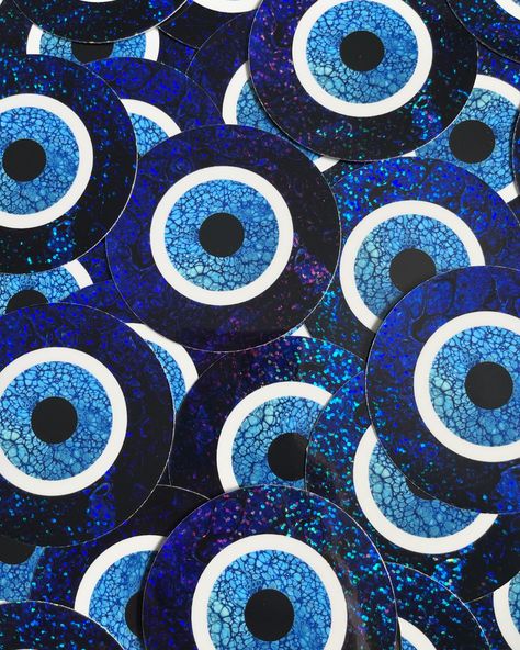 🧿 Glittery Evil Eye Symbol stickers have arrived! 🧿 The evil eye symbol wards off the evil eye, which is a curse motivated by the envy of others that can bring about bad things in your life. Each sticker features my artwork and holographic glitter within the darkest blue color in the symbol that flashes a rainbow of colors in the light. Each durable, weather-resistant vinyl sticker measures 3 inches across. . . . #evileye #evileyeprotection #evileyes #evileyeart #evileyedecor #evileyecollec... Evil Eye Logo, Evil Eye Symbol, Protection Symbols, The Evil Eye, Eye Symbol, Glitter Stickers, Bad Things, Solomon Islands, Dark Blue Color