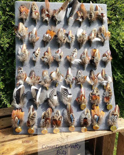 Feather Display Ideas, Tweed Crafts, Pheasant Feather Decor, Christmas Shop Displays, Shotgun Shell Crafts, Feather Boutonniere, Bullet Crafts, Hunting Diy, Bullet Art