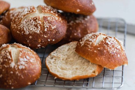 The most delicious homemade sourdough pretzel buns have a soft and fluffy interior with a deep brown exterior that tastes just like the soft pretzels you love. Perfect to serve as a side with soup or to use for sandwiches. I Sourdough Bread Recipes Pretzel Buns Recipe, Pretzel Bun Recipe, Sourdough Pretzel, Sourdough Bread Recipes, Buns Recipe Easy, Homemade Sourdough Bread Recipes, Dessert Loaf, Pretzel Buns, Pretzel Bun