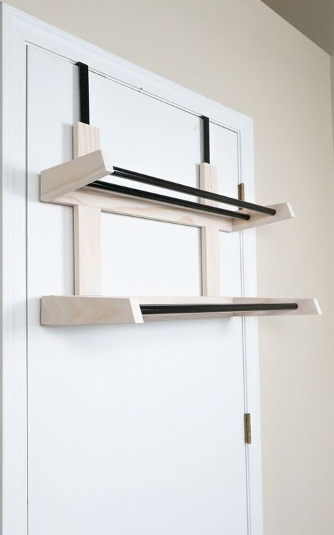 This is one of those projects that you build for immediate need in the house. The design is purely based on the functionality and easy use. We needed a door hang towel drying rack to replace the free standing drying rack to clear up floor space and not to be an eye sore in the room. Hiding them behind the door seemed to be the best option for us. So, here is the build with all the details you need to build your own.I made this rack with a couple of pine wood 1x3s, 3/4″ dia aluminum rod… Back Of Door Drying Rack, Towel Drying Rack, Over Door Towel Rack, Organized Laundry, Diy Towel Rack, Hanging Drying Rack, Door Rack, Wood Bath, White Wash Finish