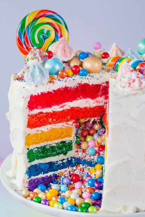 How To Make the Ultimate Rainbow Surprise Cake. Maybe you've seen cakes like this on Pinterest, your favorite baker's Instagram feed, or even IRL at your best friend's house and thought to yourself, "That cake looks so fun and complicated; I could never make that." I'm here to encourage you otherwise! You can totally make this knock-out, show-stopping surprise-inside rainbow layer cake from scratch. Piniata Cake, Swirl Cakes, Surprise Inside Cake, Rainbow Cake Recipe, Cake Flavours, Rainbow Layer Cakes, Nursing Cake, Inside Cake, Popcorn Balls