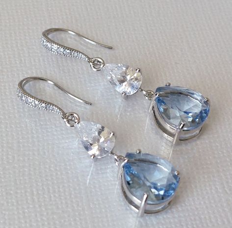 Light Blue Sky Blue Teardrop Crystal Silver Dangle Chandelier Wedding Bridal Earrings. PLEASE READ ITEM DESCRIPTION and SHOP POLICIES before placing your order, and contact me with any questions! EARRINGS are about 1.53 inch (3.9cm) long from top of ear wire to bottom. BRIDAL EARRINGS SECTION: https://www.etsy.com/shop/LanaChayka?ref=seller-platform-mcnav§ion_id=11638940 BRIDAL JEWELRY SETS SECTION: https://www.etsy.com/shop/LanaChayka?ref=seller-platform-mcnav§ion_id=25839214 BRIDAL NECKLACES S Luxury Light Blue Wedding Jewelry, Silver And Blue Necklace, Blue Crystal Jewelry, Luxury Elegant Light Blue Jewelry, Blue Wedding Accessories, Silver Teardrop Jewelry, Light Blue Earrings Aesthetic, Light Blue Jewelry Aesthetic, Light Blue Jewelry Set