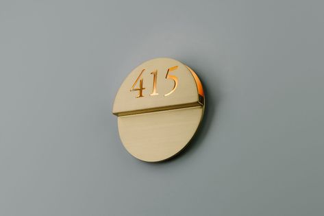 Plateau Round Sconce - Boyd Lighting Art Deco Hotel Room, Hotel Wayfinding, Room Signage, Hotel Light, Office Signage, Wayfinding Signs, Hotel Logo, Art Deco Buildings, Architectural Lighting