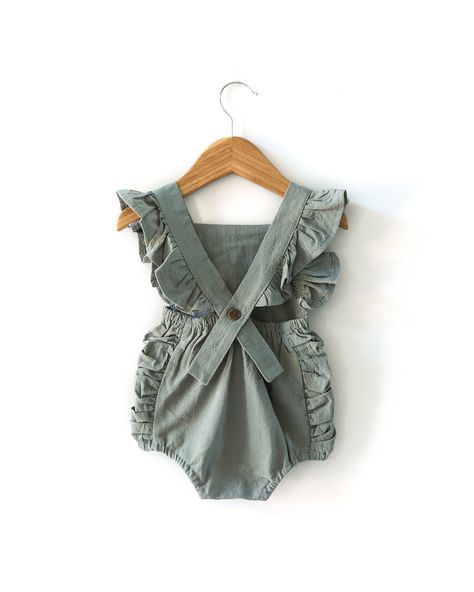 Introducing our elegant and stylish "Evelyn Romper" in sage green. The romper is made from high-quality, textured linen material that adds to its durability and comfort. The soft, breathable material makes it perfect for everyday wear and any special occasion. The romper features charming ruffle details that add a touc Easter Minis, Baby Ruffle Romper, Ruffle Bloomers, Retro Baby, Ruffle Romper, Green Baby, Business Planner, Baby Outfits