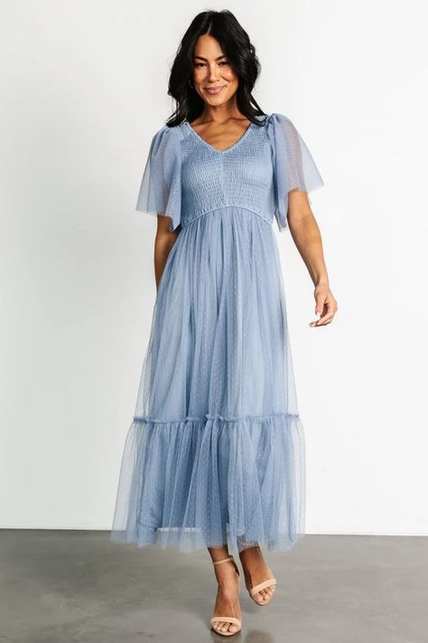 Martha Smocked Tulle Dress | Dusty Blue | Baltic Born Tea Party Bridesmaid Dresses, Modest Blue Bridesmaid Dresses, Pink And Blue Bridesmaid Dresses, Light Blue Clothes, Phoebe Wedding, Dusty Blue Dresses, Light Blue Dress Formal, Blue Baby Shower Dress, Blue Dress With Sleeves