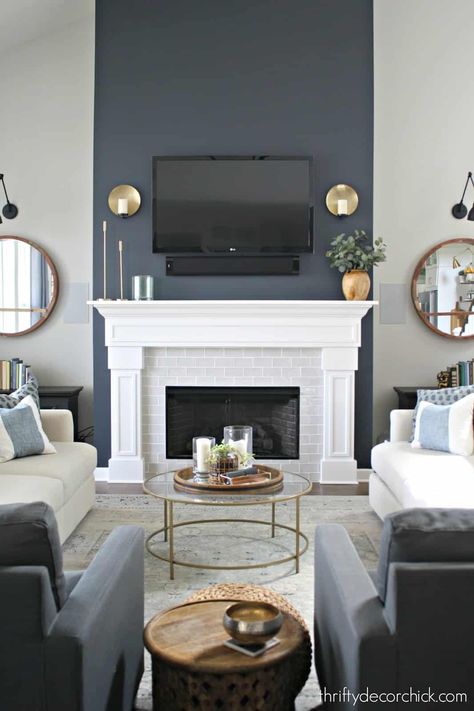 Accent walls are an easy and low risk way to add color and dimension to a room. We have lots of accent wall ideas to make your home beautiful! #accentwallideas #paintcolorideas #thecolorconcierge Fireplace Revamp, Grey Accent Wall Living Room, Dramatic Fireplace, Fireplace Transformation, Fireplace Accent Walls, Earthy Modern, Tall Fireplace, Mantle Ideas, Grey Accent Wall