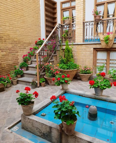 Every traditional home in Iran has it's very own private yard. They are typically filled with various flowers, fruit trees and as a center piece a turquoise colored fountain. Gardens have played a big role in ancient Persian history and continue to do so today. Iran Country, Rose Ideas, Persian Decor, Iran Culture, Iranian Architecture, Persian Architecture, Persian Garden, Iran Travel, Tehran Iran