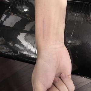 The Skill of the Single Black Line Tattoo | Tattoodo Straight Line Tattoo, Black Line Tattoo, Mike Love, Single Line Tattoo, Line Tattoo, Book Tattoo, Black Line, Straight Line, Tattoo Machine