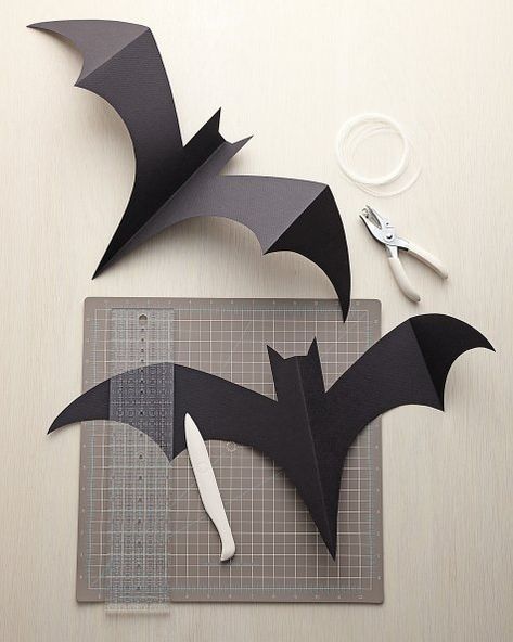 Hanging Bats | Step-by-Step | DIY Craft How To’s and Instructions| Martha Stewart Hanging Bats, Dekorasi Halloween, Halloween Porch Sign, Paper Bat, Hanging Bat, Casa Halloween, Batman Birthday Party, Batman Party, Diy Halloween Decor