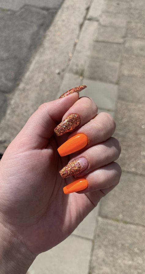 Orange Fall Nails With Glitter, Orange And Gold Glitter Nails, Orange And Glitter Nails, Fall Nails 2023 Orange, Orange Nails Glitter, Orange Nails With Glitter, Orange Sparkle Nails, Burnt Orange And Gold Nails, Orange Glitter Nails