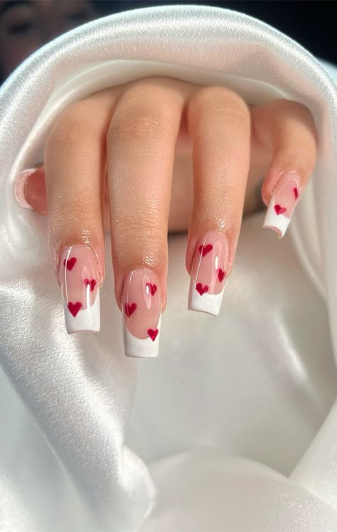 Valentine's Day nails, Romantic nail designs, Love-themed nail art, Heart-shaped nail patterns, Cupid-inspired nail ideas, Red and pink Valentine nails, Date night manicure, Valentine's Day acrylic nails, Romantic nail color trends, Love letter nail art, Heartfelt Valentine's nails, Sweetheart nail designs, Couples manicure ideas, Valentine's Day beauty trends, Love-inspired nail aesthetics Love Themed Nails, Valentines Day Nails Cupid, Red Nails With Hearts Valentines, Valentines Themed Nails, Cupid Nails Designs, Red And Pink Nails Valentines Day, Valentine’s Day Nails Red, Red Valentine’s Day Nails, Couples Manicure