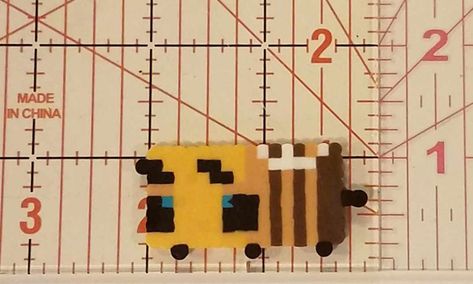 Minecraft Bee made out of perler beads. Minecraft Bee Perler Beads, Minecraft Bee, Ironing Beads, Hama Beads 3d, Melt Beads Patterns, Bee Wings, Perler Creations, Hama Beads Minecraft, Melting Beads