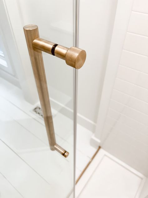 Frameless Glass Shower Door, Shower Door Handles Hardware, Brizo Luxe Gold Bathroom, Shower Door Ideas, Gold Shower Door, Gold Shower Fixtures, Brass Shower Door, Sliding Glass Shower Door, Bronze Shower Door